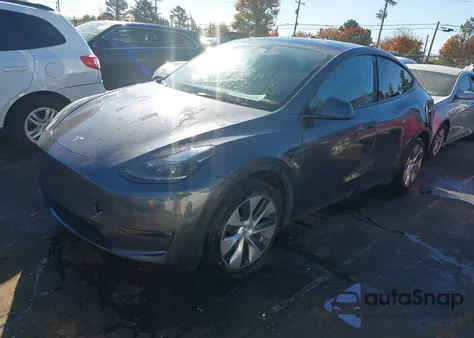 2023 Tesla Model Y Rwd from USA, damaged, VIN 7SAYGDED8PF943012